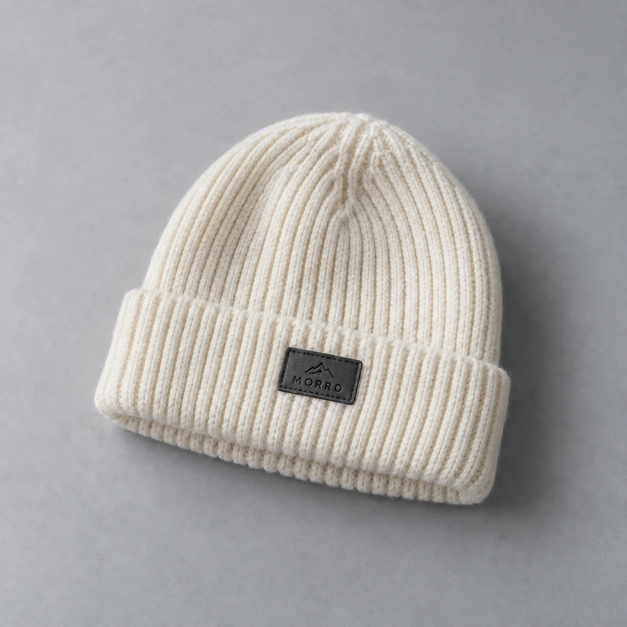 Concept photograph of a small patch on a knitted hat