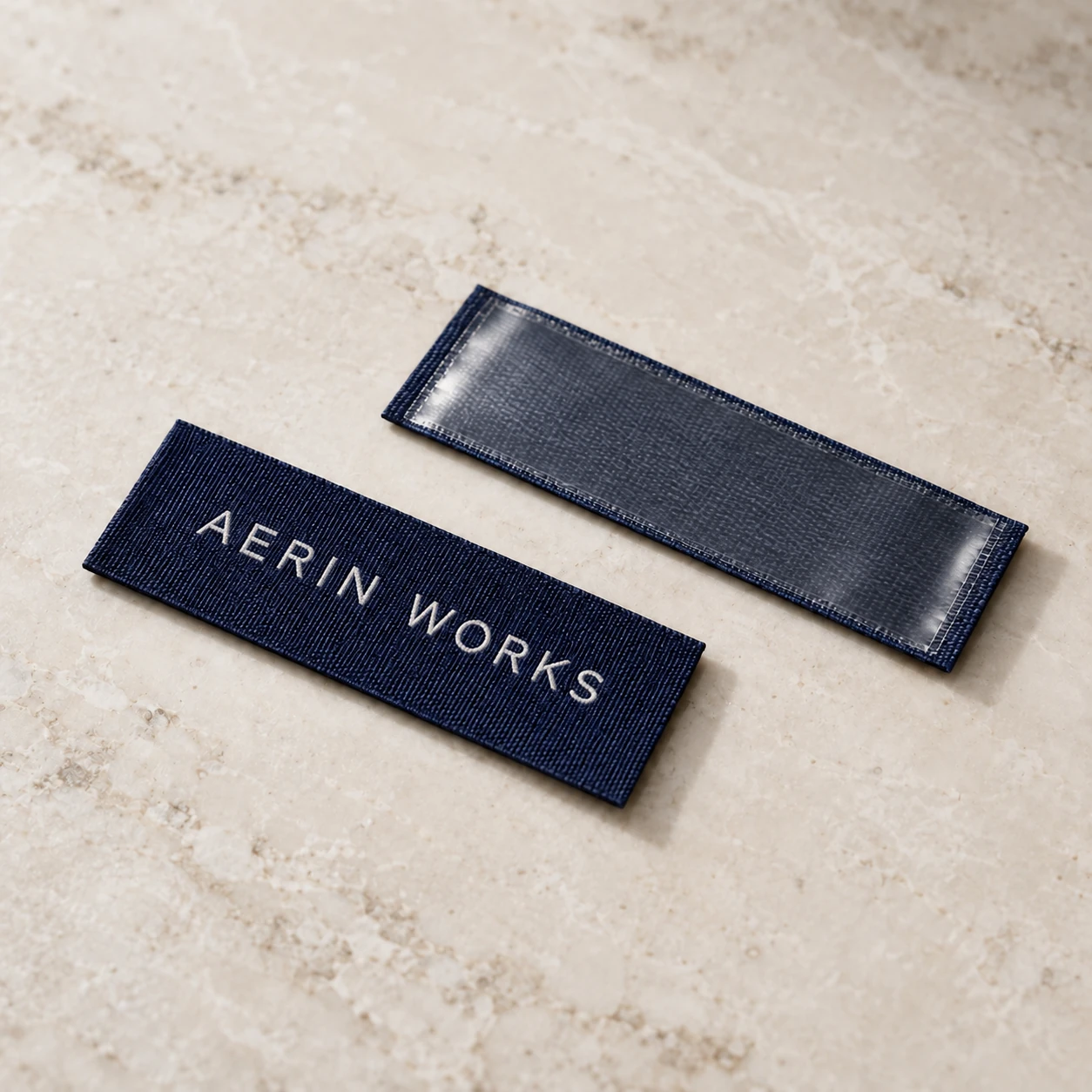 Woven label face and bonded heat-seal backing